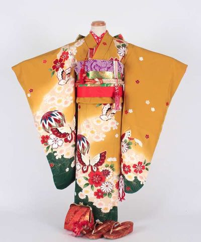 七五三(七歳) | 黄土色地に緑青海波 鞠と菊と桜に蝶