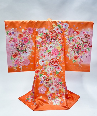 産着(お宮参り) | オレンジ地に花々と鞠